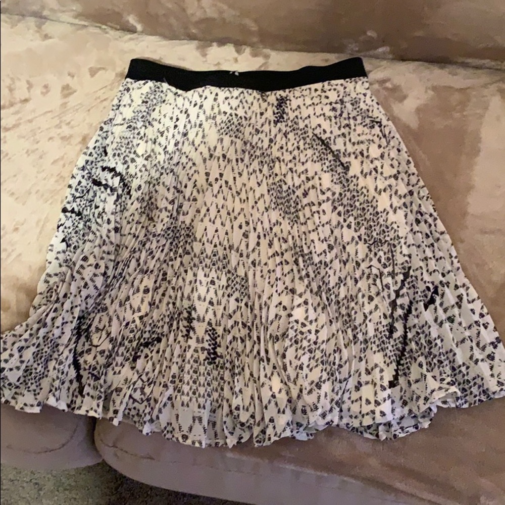 Cute kind of long cream and black skirt